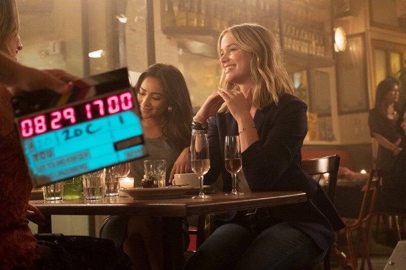 Shay Mitchell and Elizabeth Lail on set.