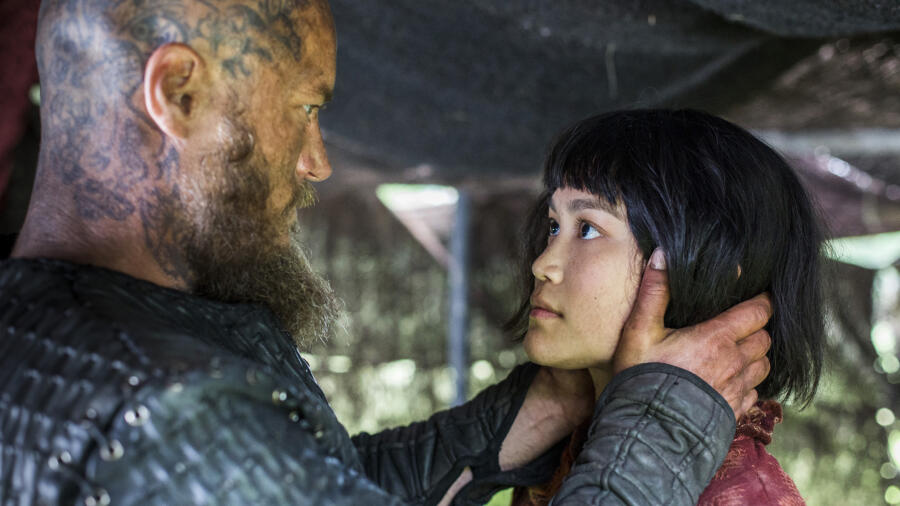 Travis Fimmel as Ragnar, Dianne Doan as Yidu, Vikings