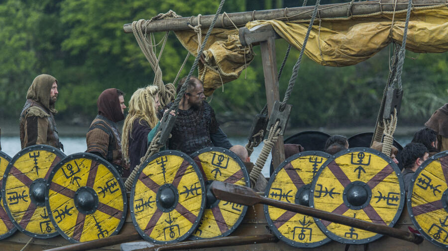 Gustaf Skarsgård as Floki, Maude Hirst as Helga, Vikings