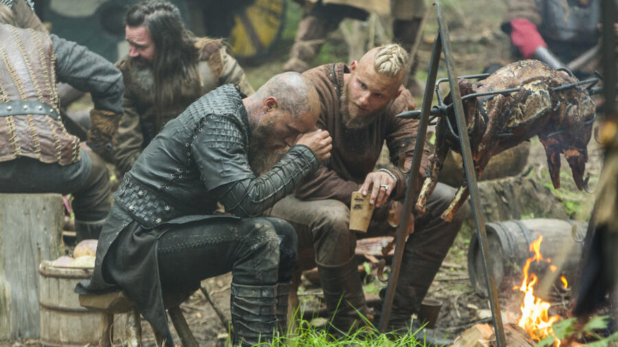 Alexander Ludwig as Bjorn, Travis Fimmel as Ragnar, Vikings