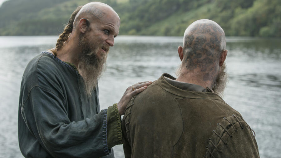 Gustaf Skarsgård as Floki, Travis Fimmel as Ragnar, Vikings
