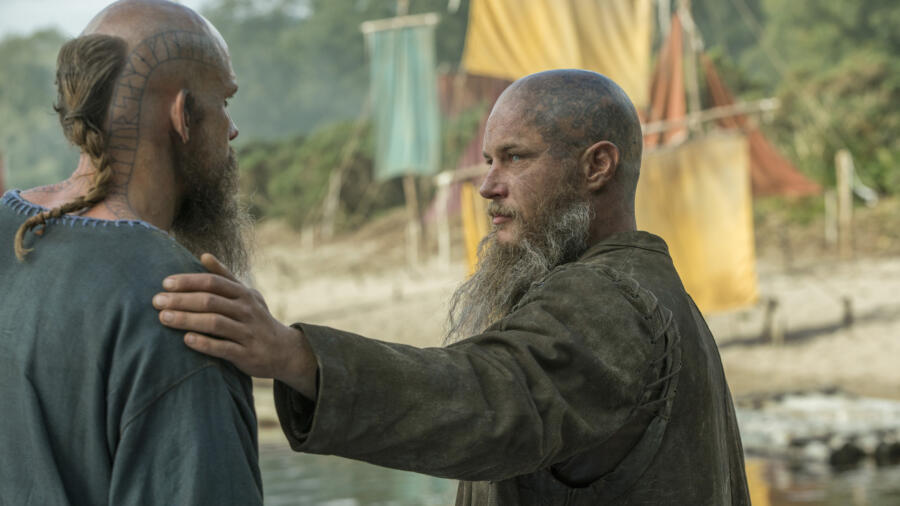 Gustaf Skarsgård as Floki, Travis Fimmel as Ragnar, Vikings