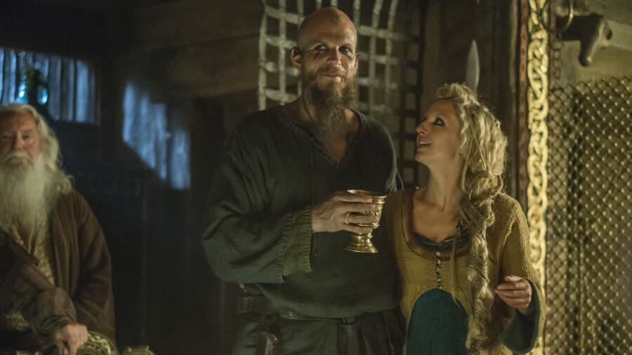 Gustaf Skarsgård as Floki, Maude Hirst as Helga, Vikings