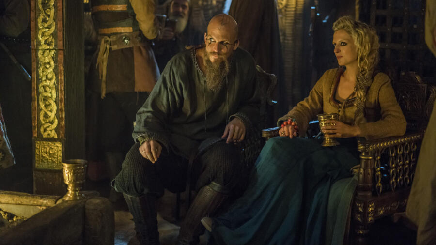 Gustaf Skarsgård as Floki, Maude Hirst as Helga, Vikings