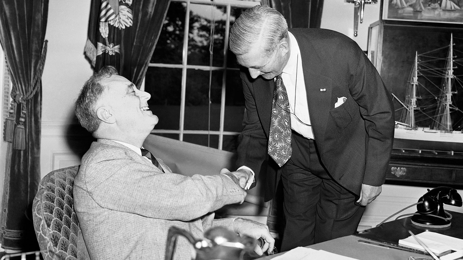 William Knudsen meeting with President Franklin D. Roosevelt.
