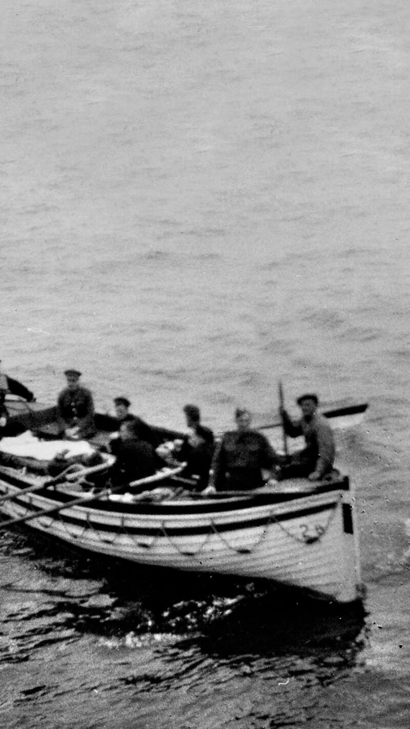 Wounded soldiers in a life boat.