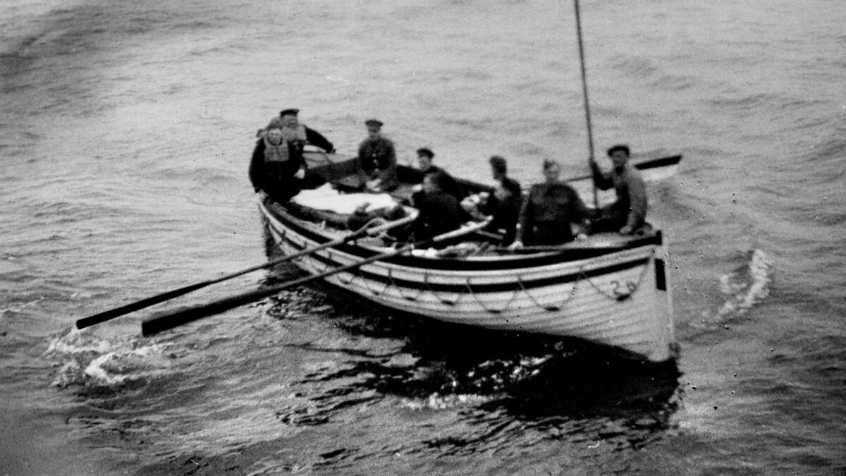 Wounded soldiers in a life boat.