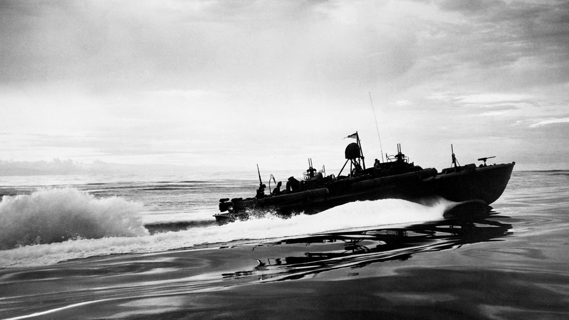 A PT boat patrolling the waters along the coast of New Guinea, 1943.