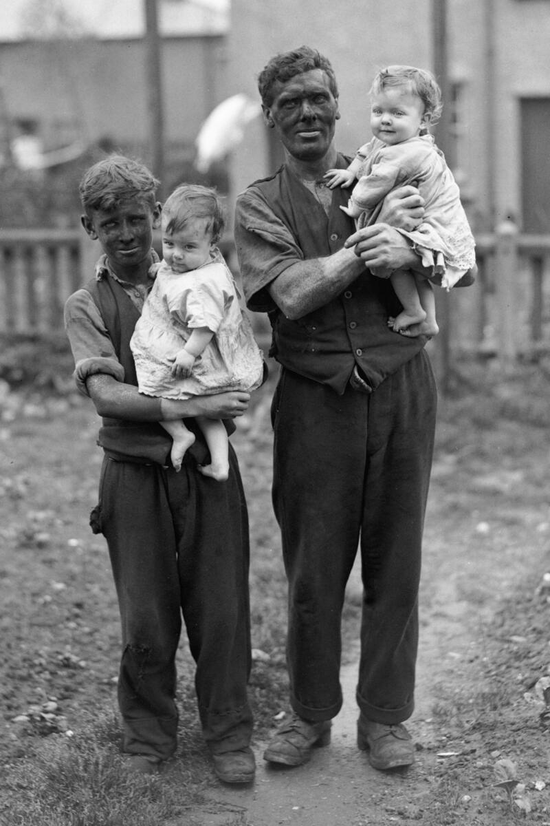 Miner and his family in Rhondda Valley, South Whales