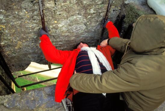 Why do people kiss the Blarney Stone?