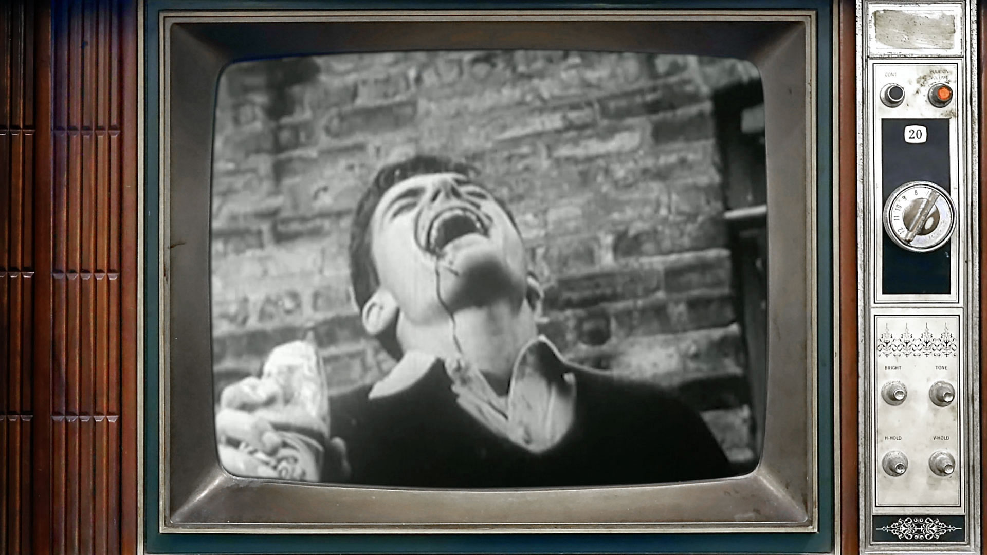 An old-school television playing a clip from the movie: Reefer Madness