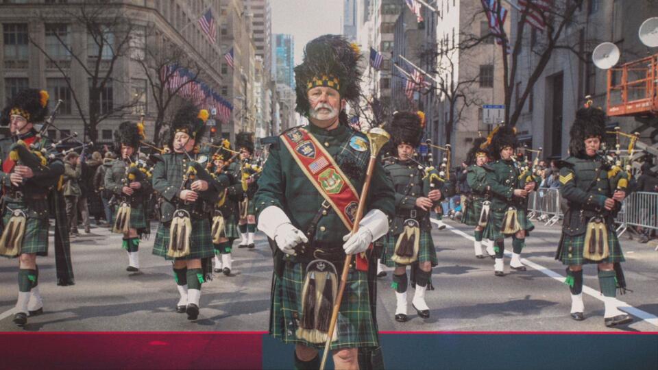 a man dressed in traditional irish regalia with bap pipes