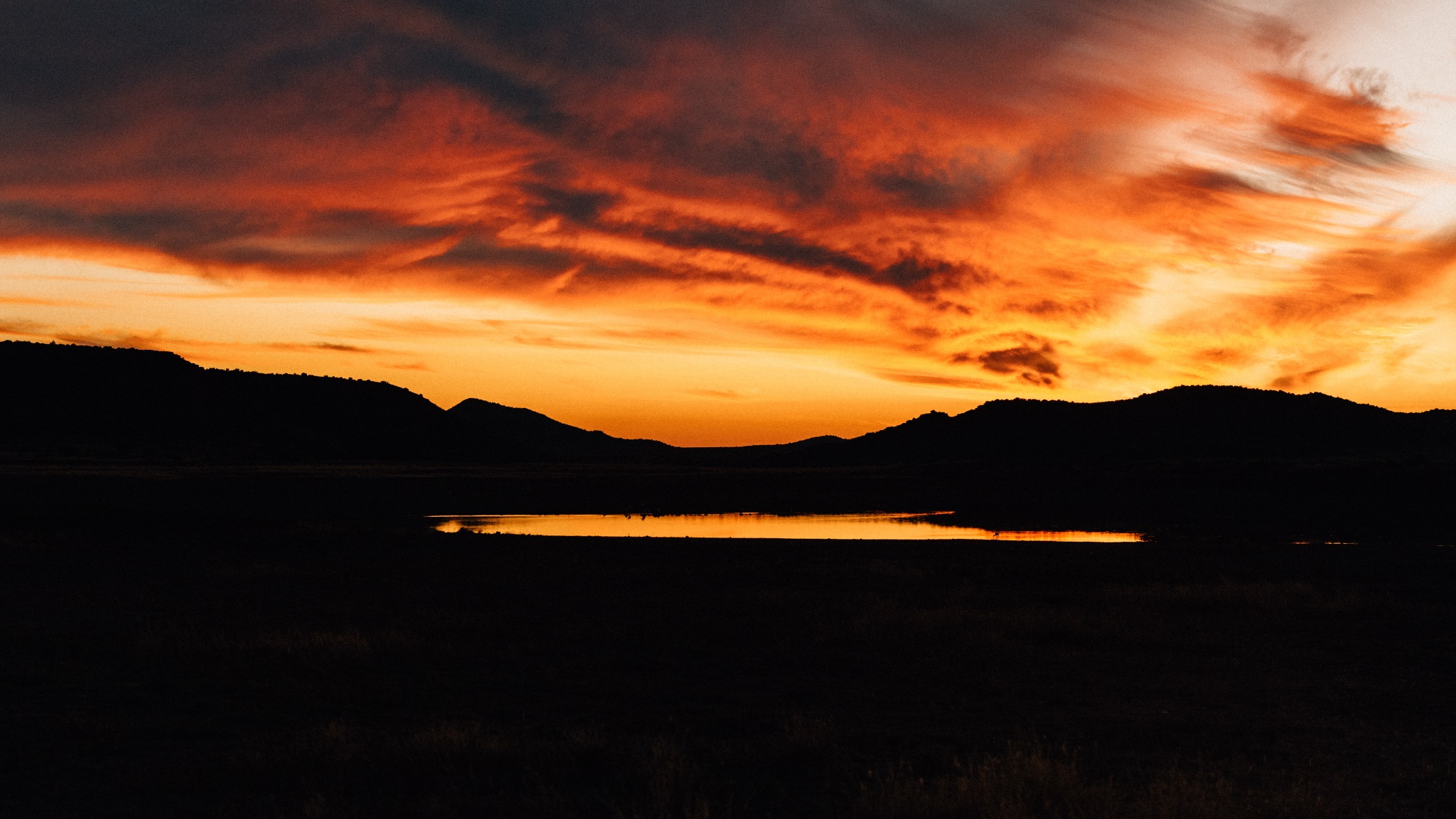 A photo of the desert at sunset