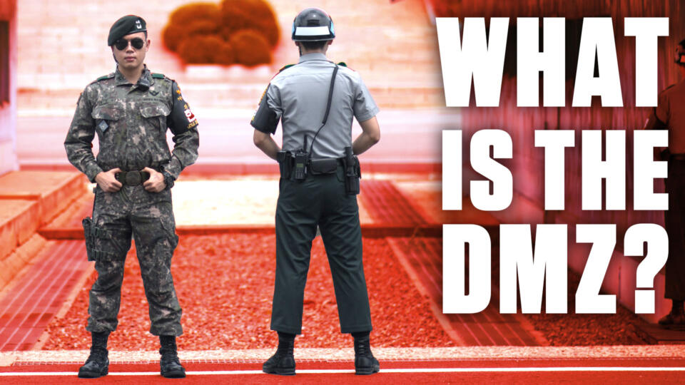 a photo of north and south korean soldiers guarding the demilitarized zone