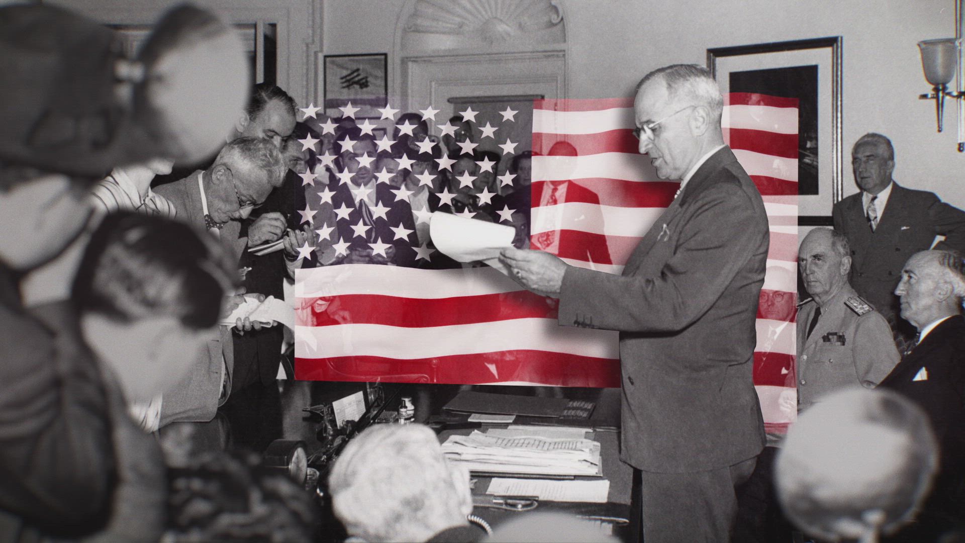 a photo of president harry truman discussing war efforts