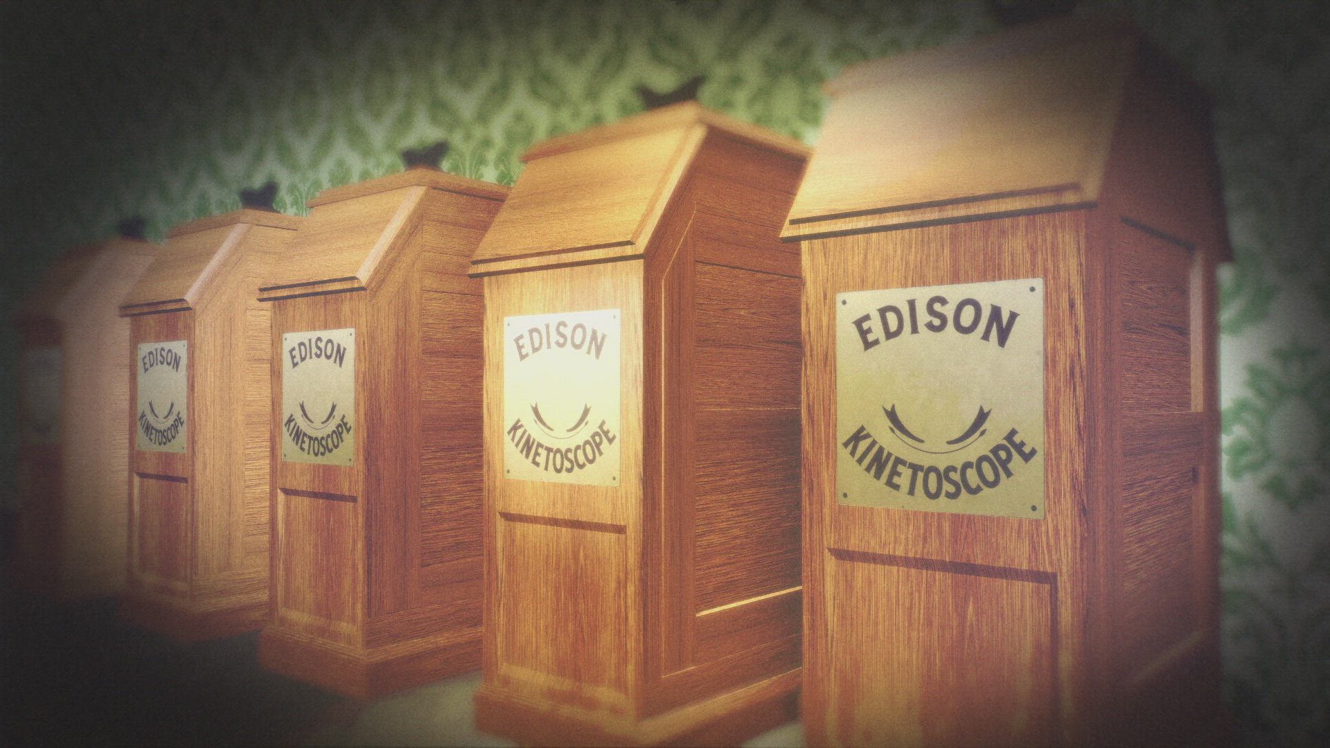 a photo of three kinetoscope machines