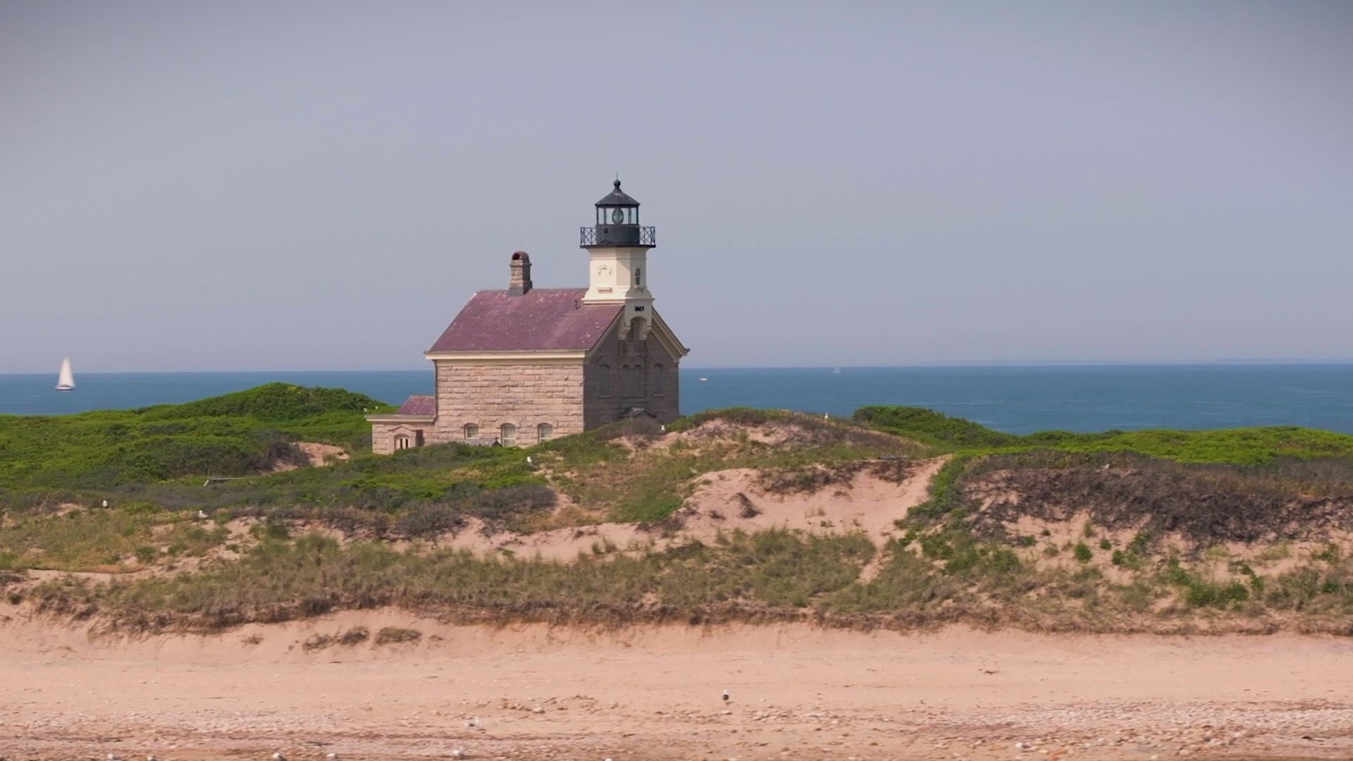 The image displays the iconic Mohegan Bluffs located on the southern shore of Block Island, Rhode Island.