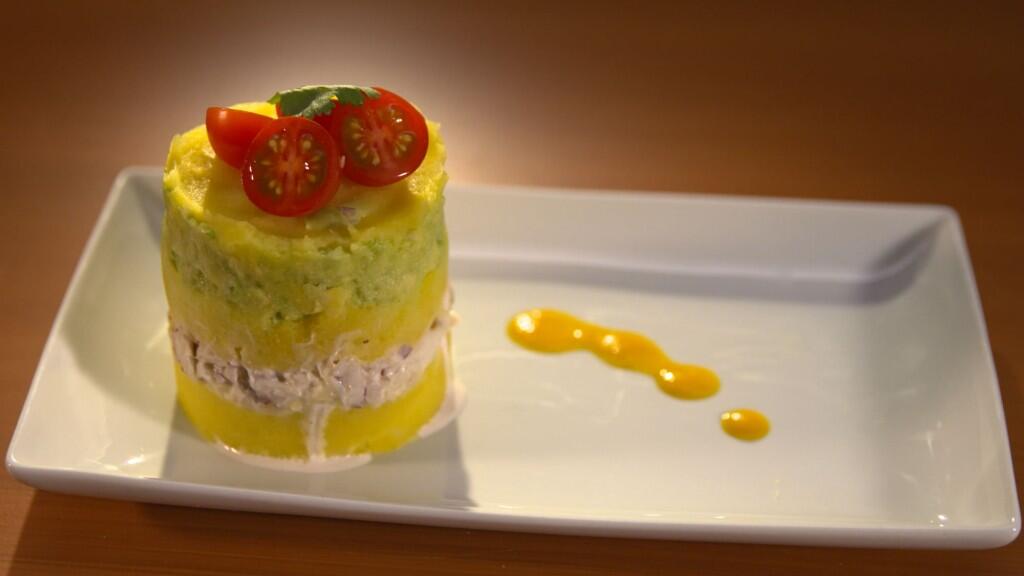 Crab Causa with Ají Amarillo Sauce and Heirloom Tomato Salad
