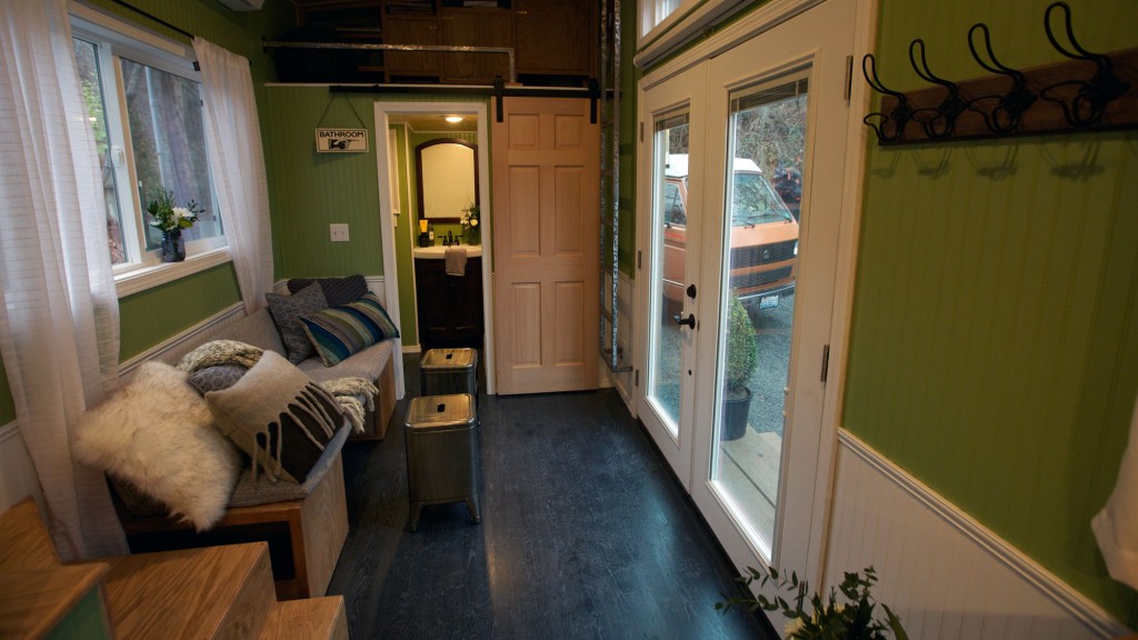 We're a married couple who live in side-by-side tiny homes & save $600 a  month - they're each designed to our own tastes