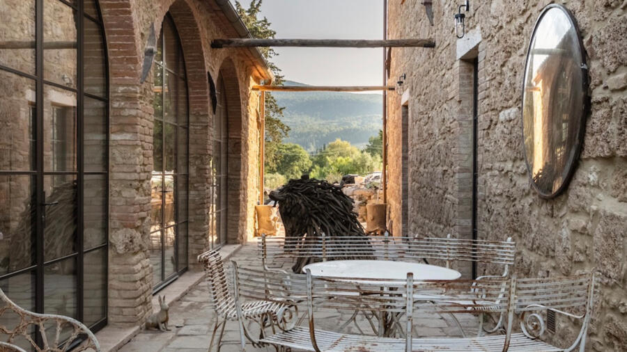 The Loggia: a covered outdoor room between the 2 structures, with one side open to the garden.