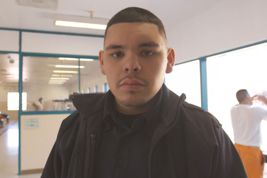 Carlos poses for a photo