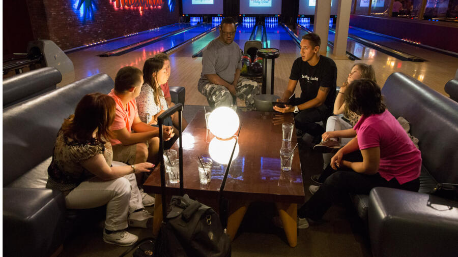 The group gets ready to bowl