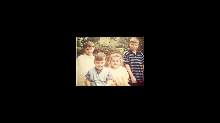 Old photo of John Luke, Cole, Sadie, and Reed Robertson as young children
