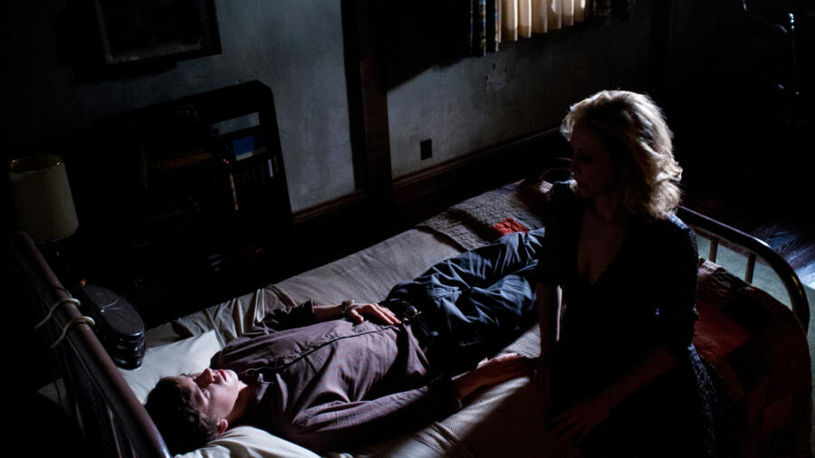 Norma goes to Norman's bedside