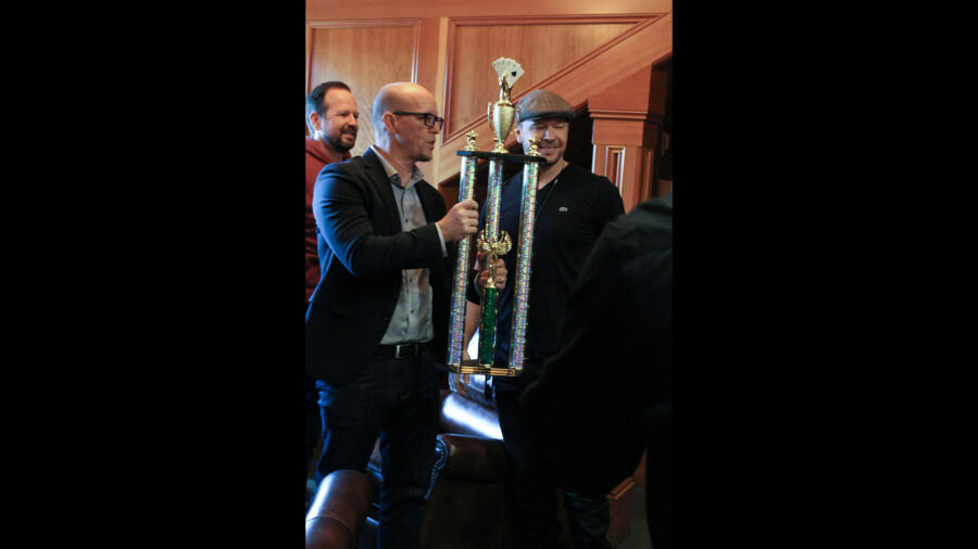 Jim presents the trophy