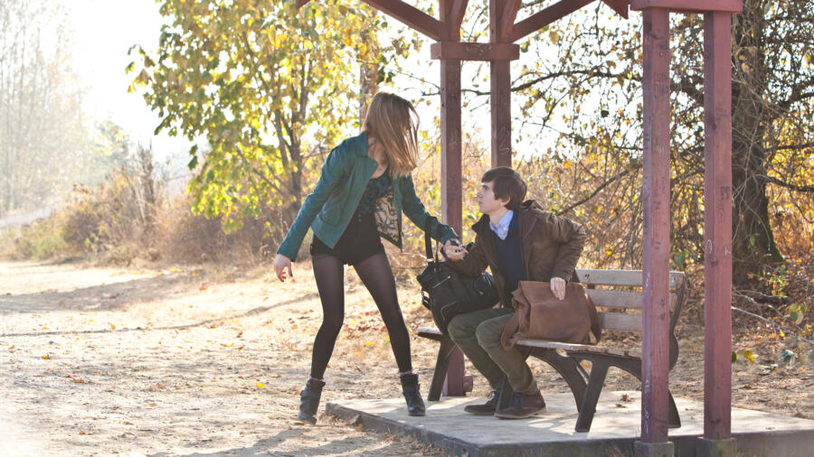 Bradley drags Norman to car