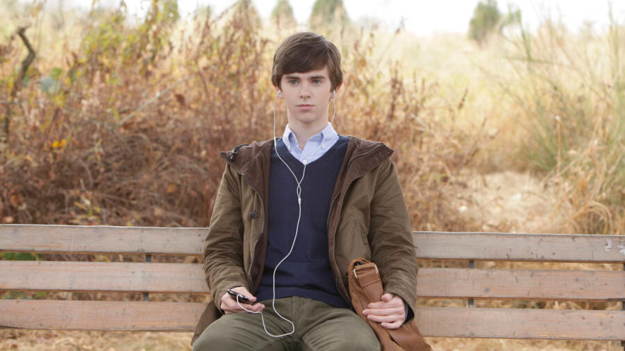 Norman waits at bus stop
