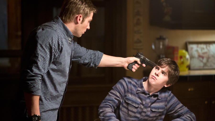 Shelby puts gun to Norman's head