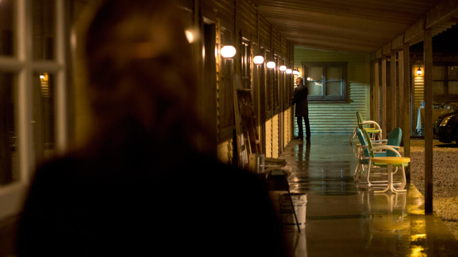 A man tries to open room 9