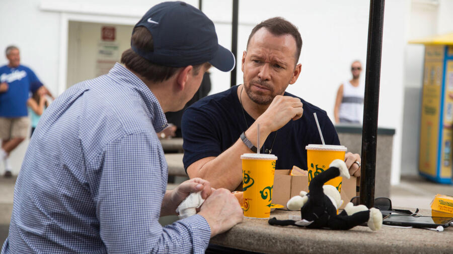 Paul and Donnie have hot dogs.