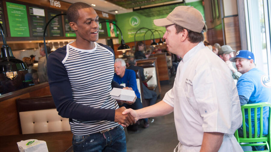Paul shakes hands with Rajon Rondo