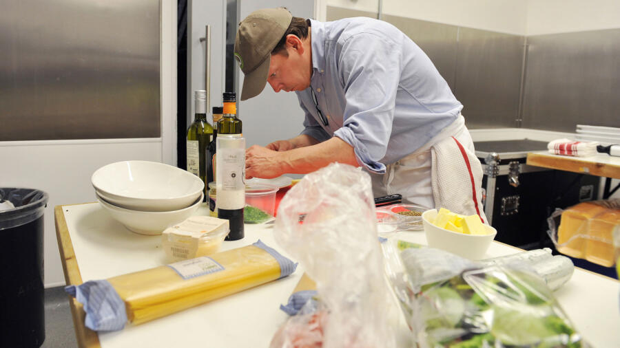 Paul gets busy in the kitchen