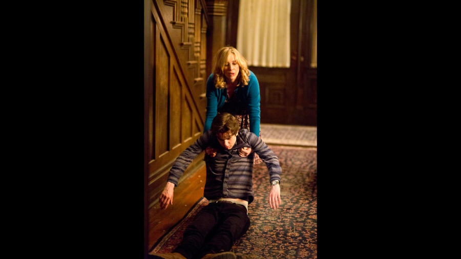 Norma drags Norman out