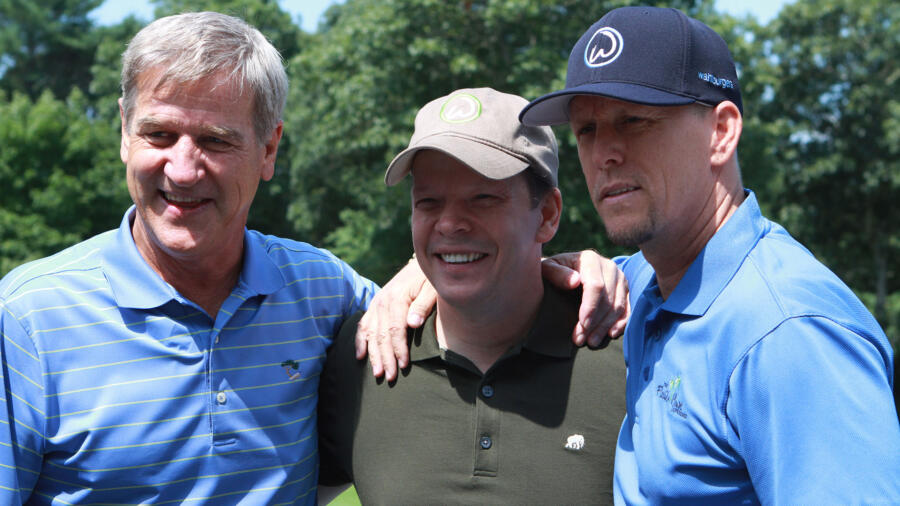 Bobby Orr poses with Paul and Jim