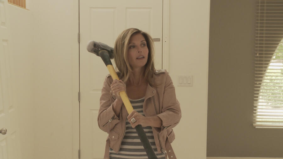 Amie takes matters into her own hands to demolish an ugly wall.