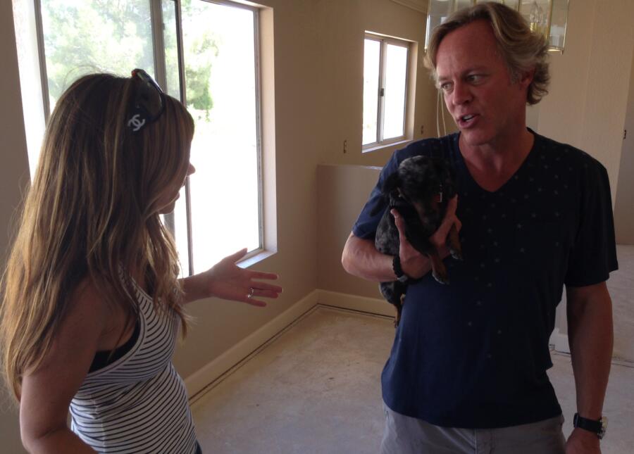 Scott and Amie hear an animal in a house they're flipping, so they bring in their dog to help drive it from its hiding place.