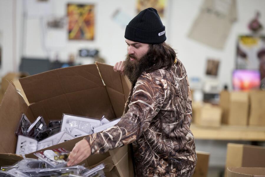 Jep Robertson helps get a big order together.