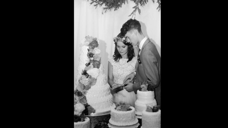 Mary Kate and John Luke Robertson cut their wedding cake