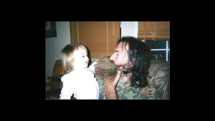 Old photo of Lily Robertson with her grandfather Phil