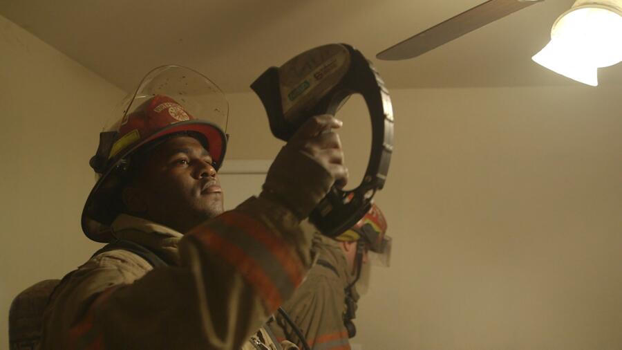 Firefighter looks for hot spots