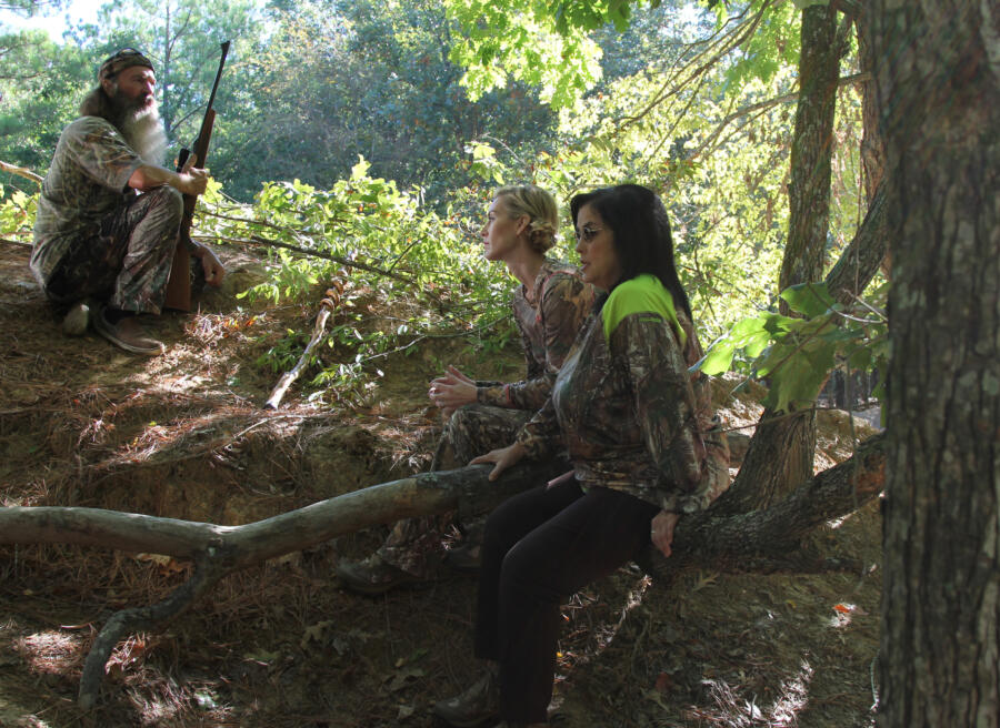 Jessica and Kay are bored during the hog hunt