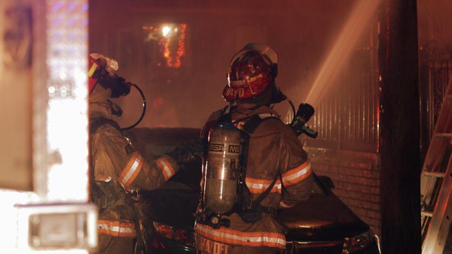 The fire department on the scene of a multi-home fire