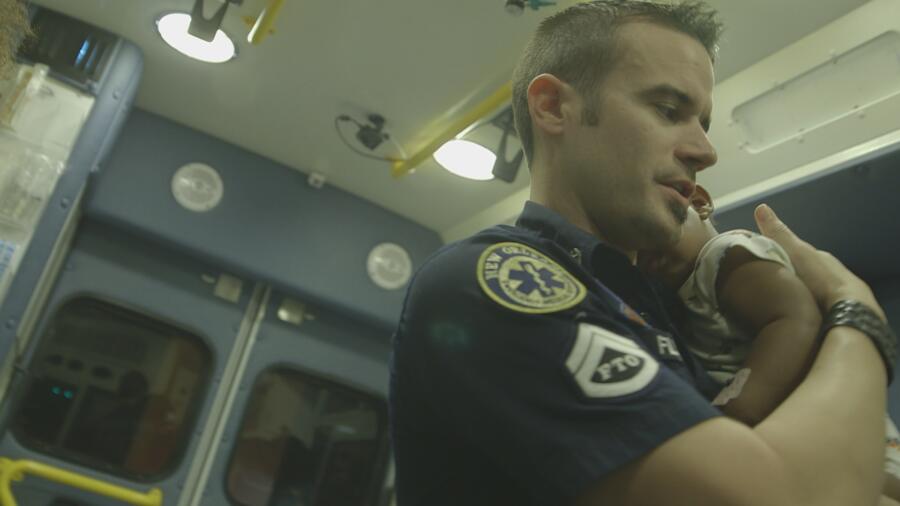 Dan takes care of a baby