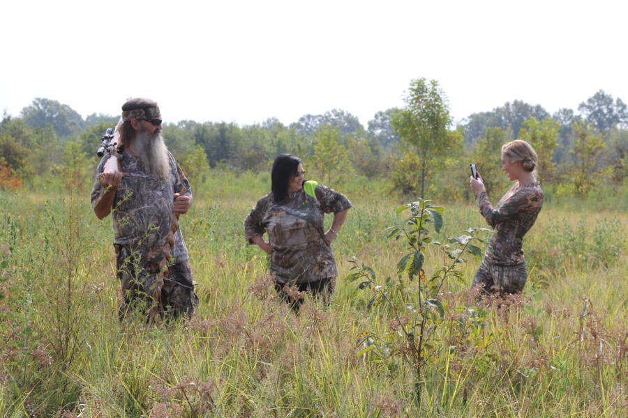 Phil, Kay, and Jessica on a hog hunt