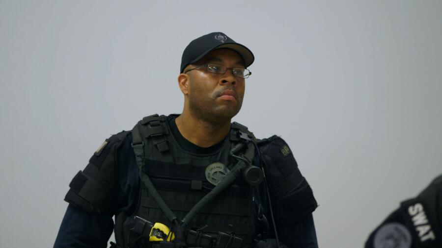 Officer Victor Gant prepares for a SWAT roll