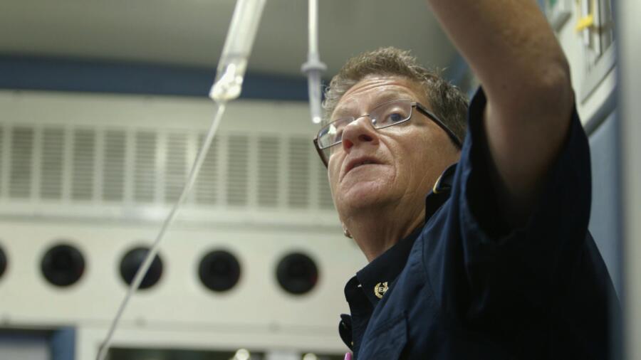 Keeley prepares an IV for a patient